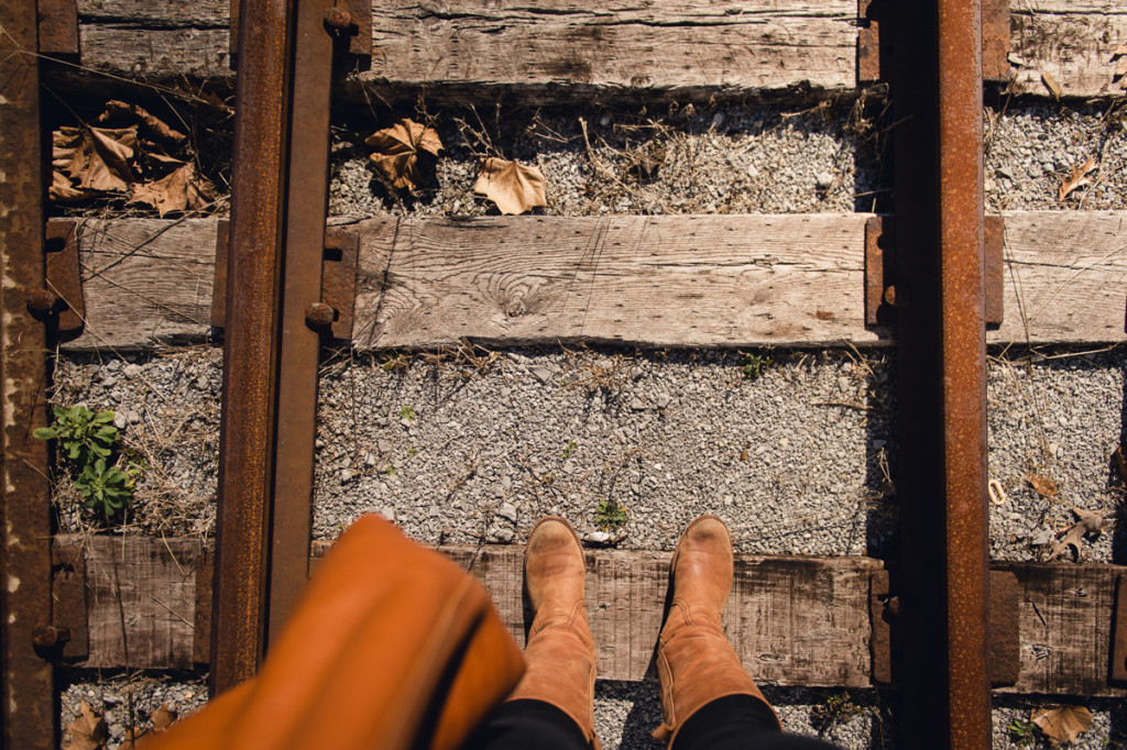 self portrait of boots on a train track picture by megan cieloha