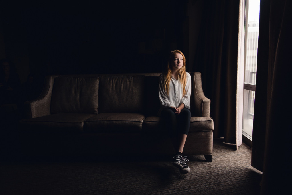 dramatic indoor natural light portrait photo by megan cieloha