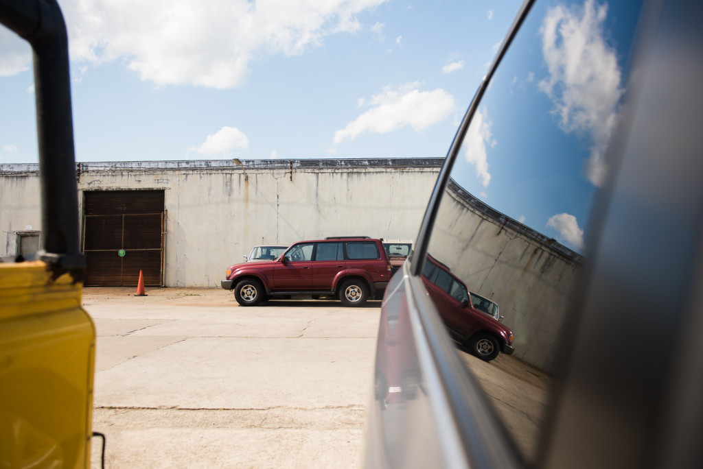 cars with reflection under a sunny sky in a natural light photo by megan cieloha